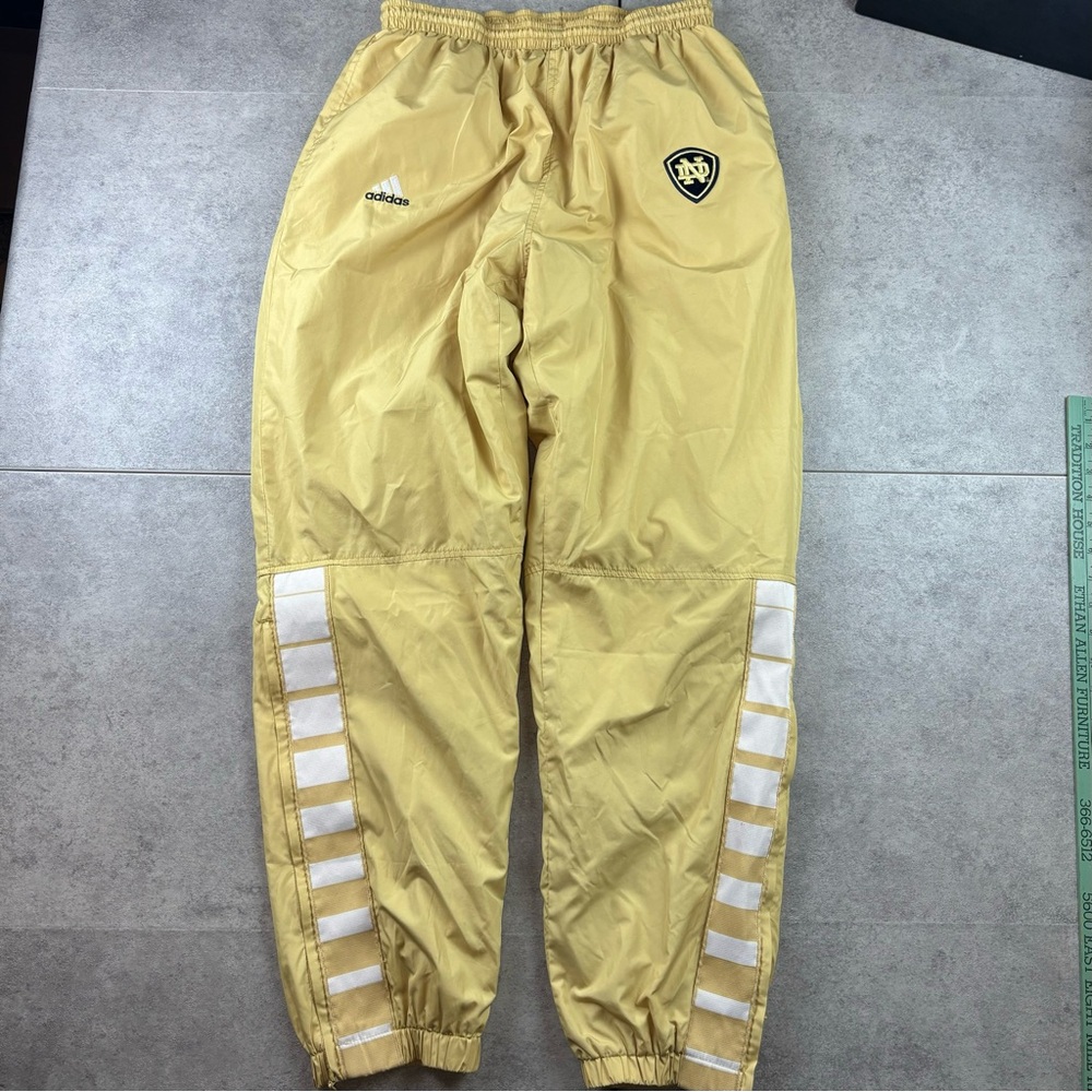 Vintage gold adidas notre dame track pants